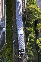 Derailed train car in Japan