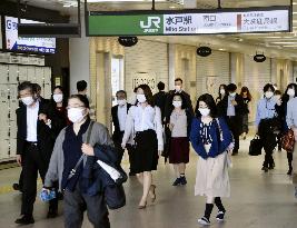 Japan lifts coronavirus emergency in most regions