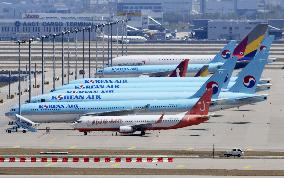 Korean Air, Asiana report 1st-quarter losses