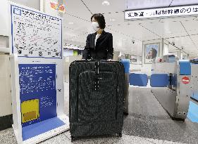 Reserved space for large luggage on bullet trains