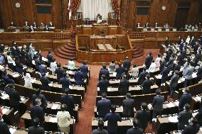 Japan enacts record extra budget