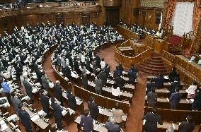 Japan enacts record extra budget