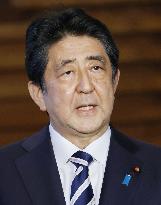 Japan enacts record extra budget