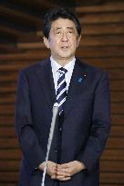 Japan enacts record extra budget