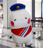 Airport mascot promotes wearing face masks
