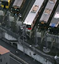 Derailed train at yard in western Japan