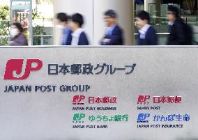 Penalties on Japan Post units over improper insurance sales