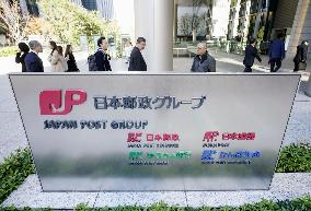 Penalties on Japan Post units over improper insurance sales