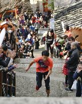 Step-climbing contest at Japanese temple