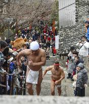 Step-climbing contest at Japanese temple