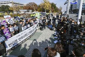 Protest against bill to settle wartime labor row with Japan