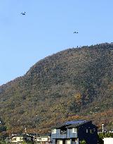 Osprey aircraft flying over western Japan