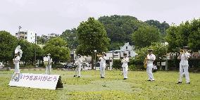 Japan MSDF band performs for healthcare workers