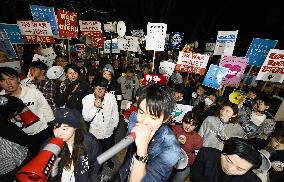 Young Japanese rally against security legislation