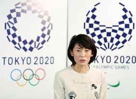 New Tokyo Olympics minister calls on staff to get stuck in