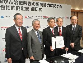 Japan makers agree to co-develop new cancer radiotherapy device