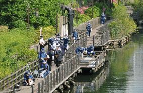 Man, 9-year-old son found dead in Tokyo river after night fishing