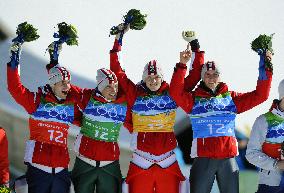 Austria wins Olympic men's ski jumping team event