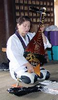 Japanese lute player starts pilgrimage of 88 temples