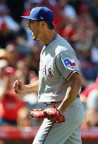 Baseball: Darvish gets 1st win of season