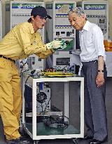 Emperor Akihito visits recycling firms in Tokyo