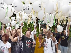 Families of missing Flight 370 press for search to continue