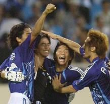 Japan shoot down Aussies, Kawaguchi celebrates with teammates