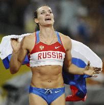 Russia's Isinbaeva wins women's pole vault with world record