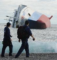 Overturned Japanese ferry inspected