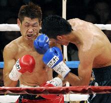 Hasegawa wins WBC featherweight title