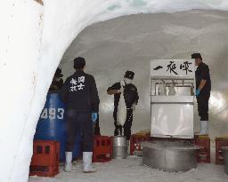 Fresh rice wine squeezed out in Hokkaido ice dome