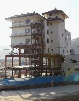 Tsunami-hit hotel in Iwate Pref. undergoing preservation work