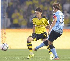 Kawasaki's Okubo, Dortmund's Kagawa compete in friendly match