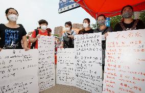 People seek missing persons' info after Tianjin explosions