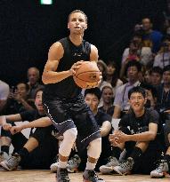 NBA star Curry scores three-pointer before Japanese fans