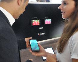 Visitor to IFA trade fair in Berlin views Sony's 4K smartphone