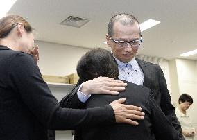 SNAPSHOT: Released couple reunited with families for 1st time in 20 yrs