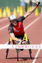 Marcel Hug of Switzerland wins Oita Int'l Wheelchair Marathon