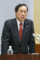 New Japan banking group chief speaks to reporters