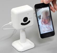 Wireless camera monitors baby, pet with smartphone via Internet
