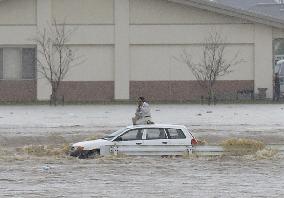 Torrential rain causes floods, landslides in eastern Japan