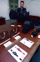 Fake goods rejected by Japan displayed