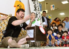 People compete in unique anger-venting event by flipping tables