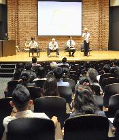 Japanese university academics meet to protest security bills