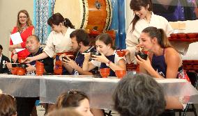 Speed-eating contest of Japanese noodles at Milan Expo