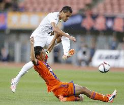 Sanfrecce MF Douglas unleashes shot in J-League match vs. Albirex