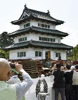 Transfer of castle tower starts in Hirosaki