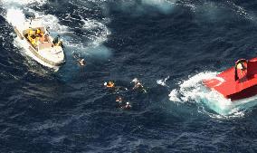 3 rescued from capsized boat off Tokyo