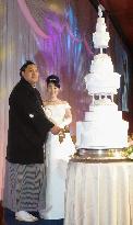 Sumo wrestler Okinoumi holds wedding reception