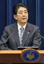 Abe cites deep remorse, apology in WWII statement